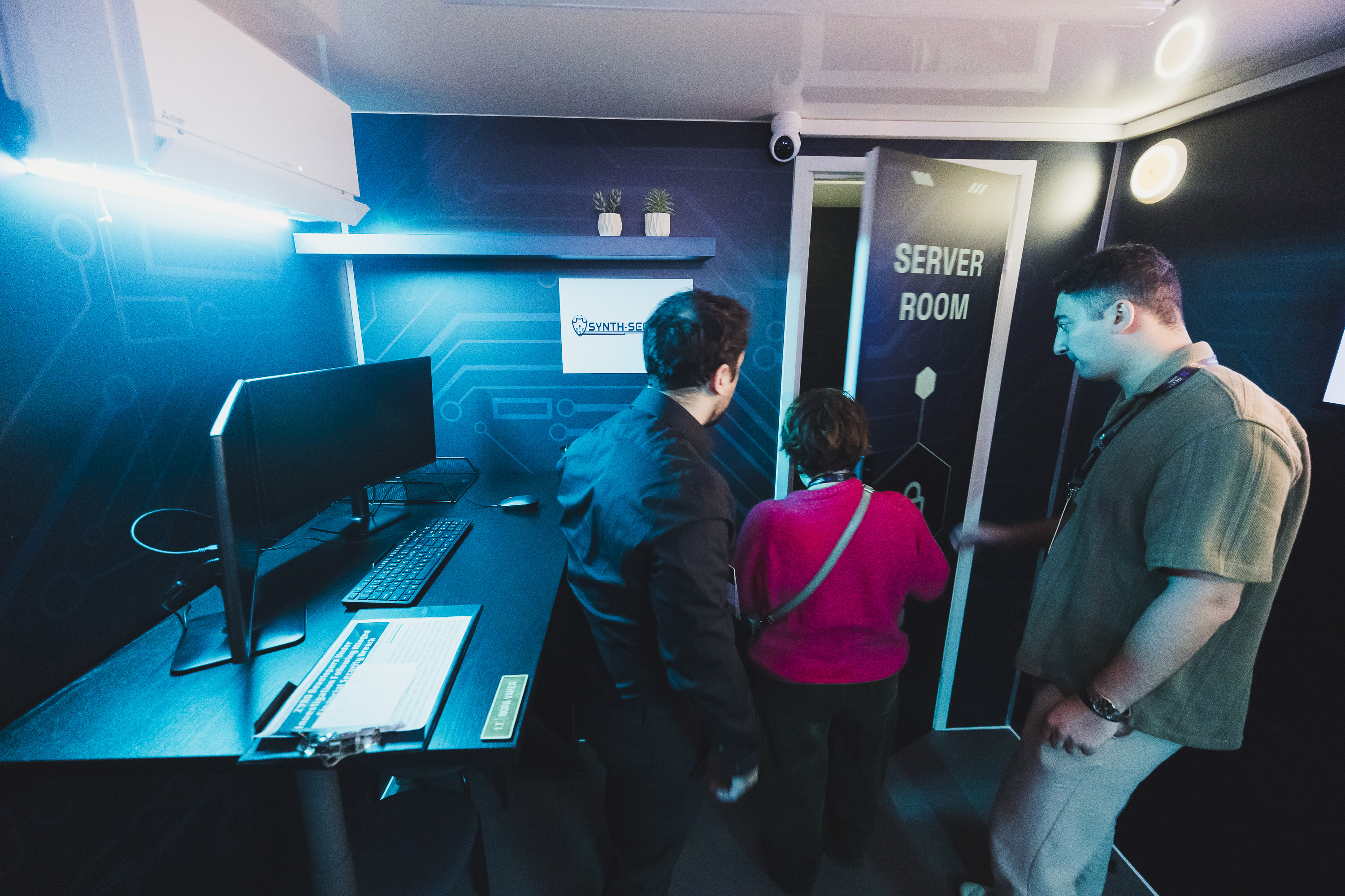 Participants opening the server room door